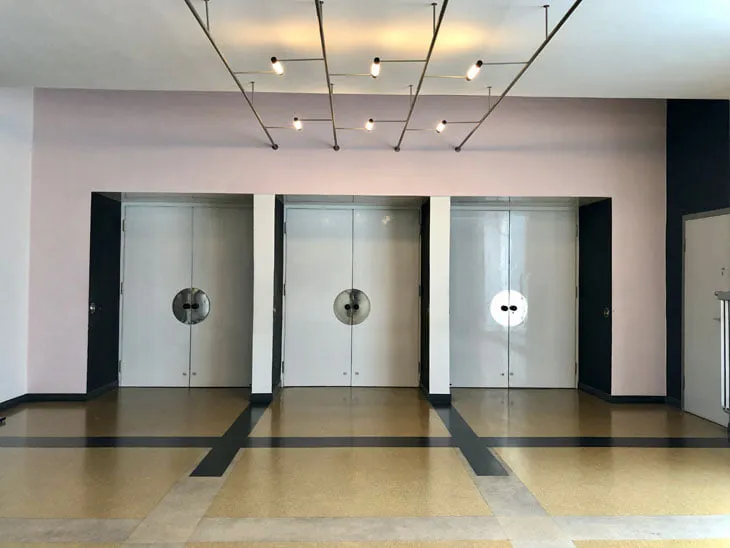 The auditorium foyer. Walter Gropius designed the door handles. In fact, a handle he designed and had mass-produced in the Bauhaus workshops could be considered the most commercially successful Bauhaus product of all time.