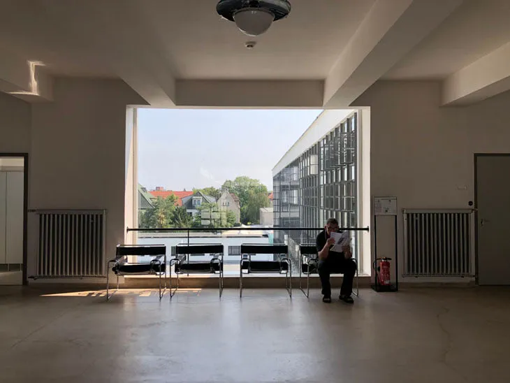 The halls are bright and spacious; the chair is, of course, an icon. Marcel Breuer’s Wassily Chair, designed in 1925, was later named after the painter and Bauhaus master Wassily Kandinsky, who admired it. Inspired by a bicycle frame and produced by Knoll, it remains an object of desire all these years later.